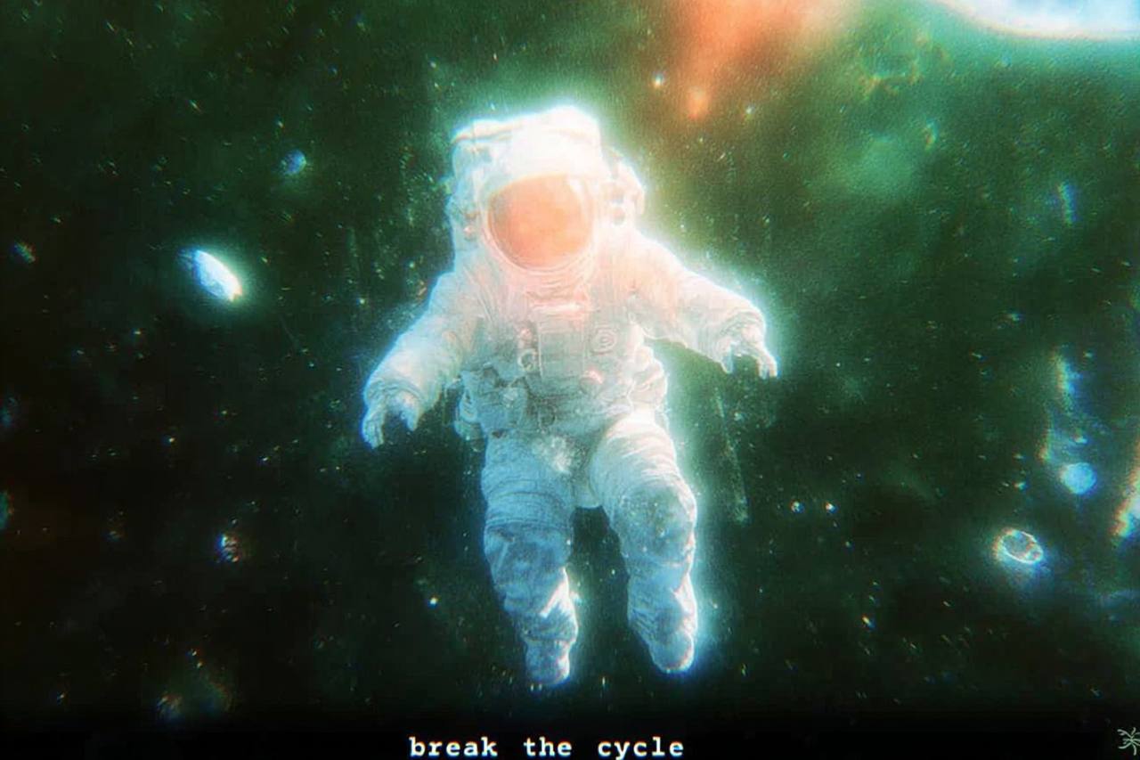 Astronaut floating through nebula-filled space—infinite exploration.